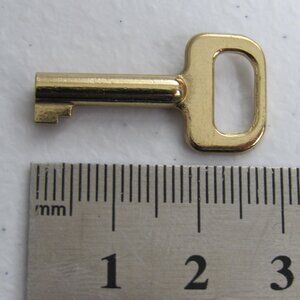 Vintage gold tone key